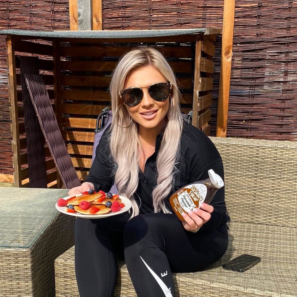 Shannon is able to soak up the sunshine in her garden on wicker furniture