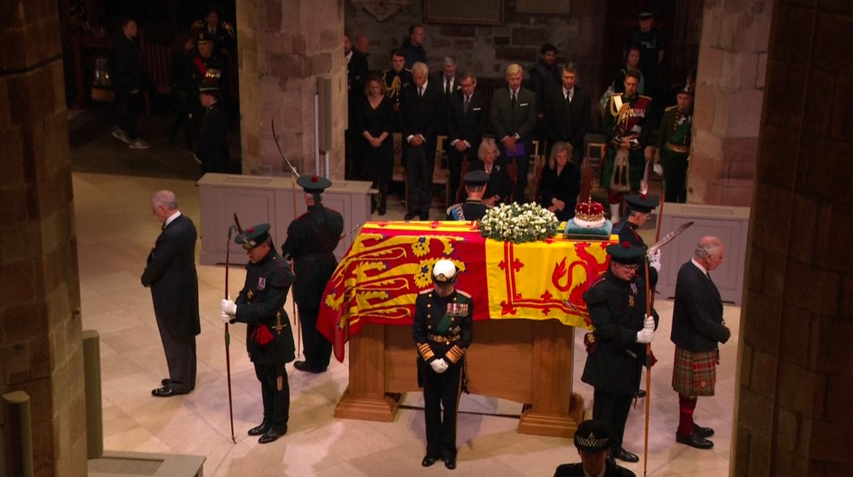 Queen Camilla and Sophie, Countess of Wessex watch the siblings guard the coffin