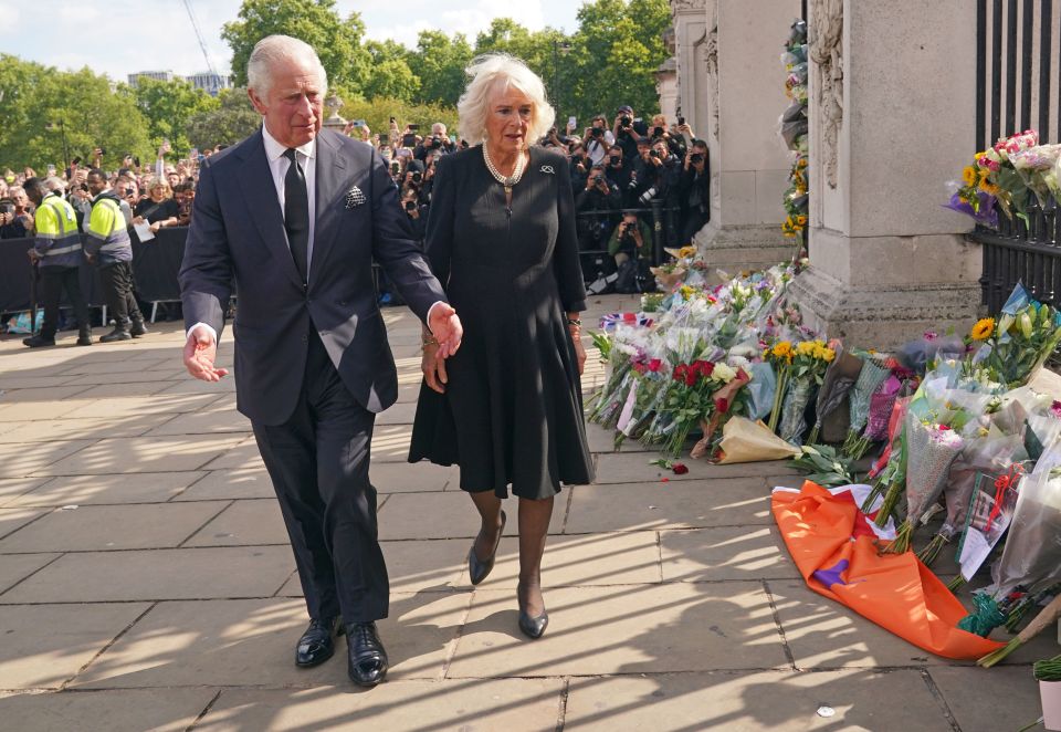 King Charles gestured at the huge volume of flowers that have been left