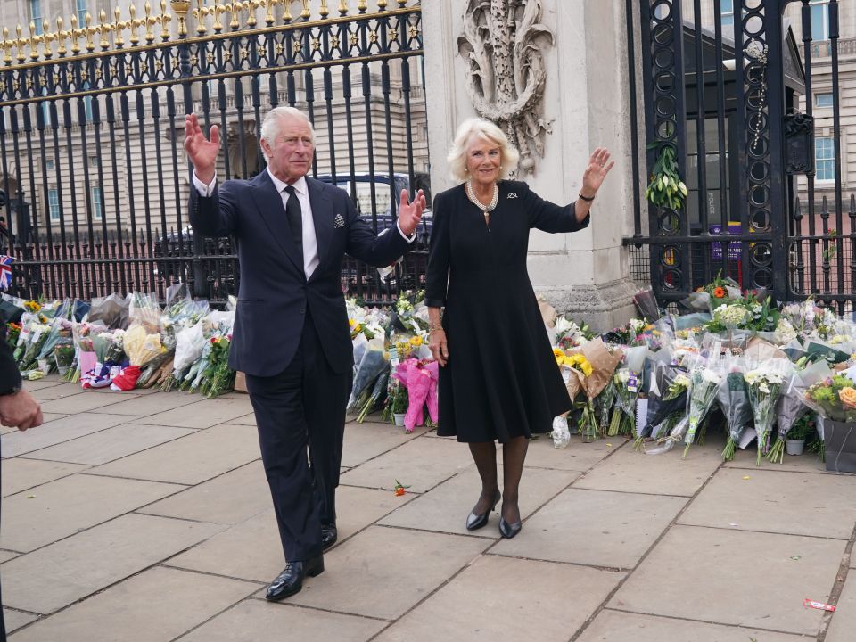 His Majesty, 73, was cheered by crowds as he arrived with Queen Camilla at Buckingham Palace today