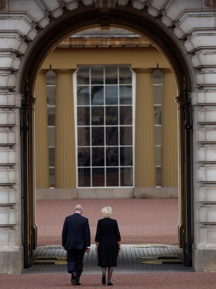 The royal couple enter Buckingham Palace as King and Queen Consort