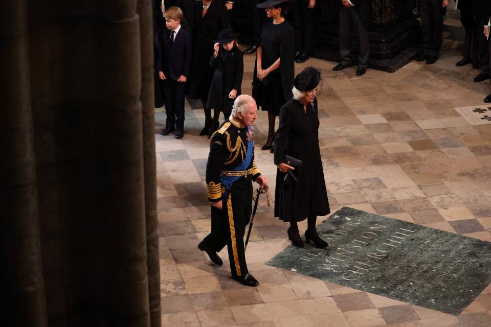 The King and Queen Consort Camilla arrive to take their seats