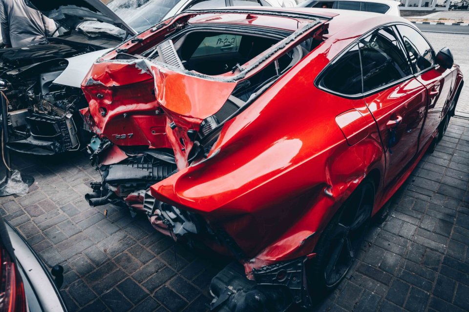 The supercars have been rotting in a scrapyard