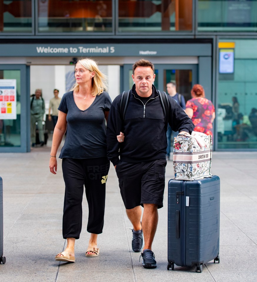 Ant wheeled the couples' designer luggage into the airport