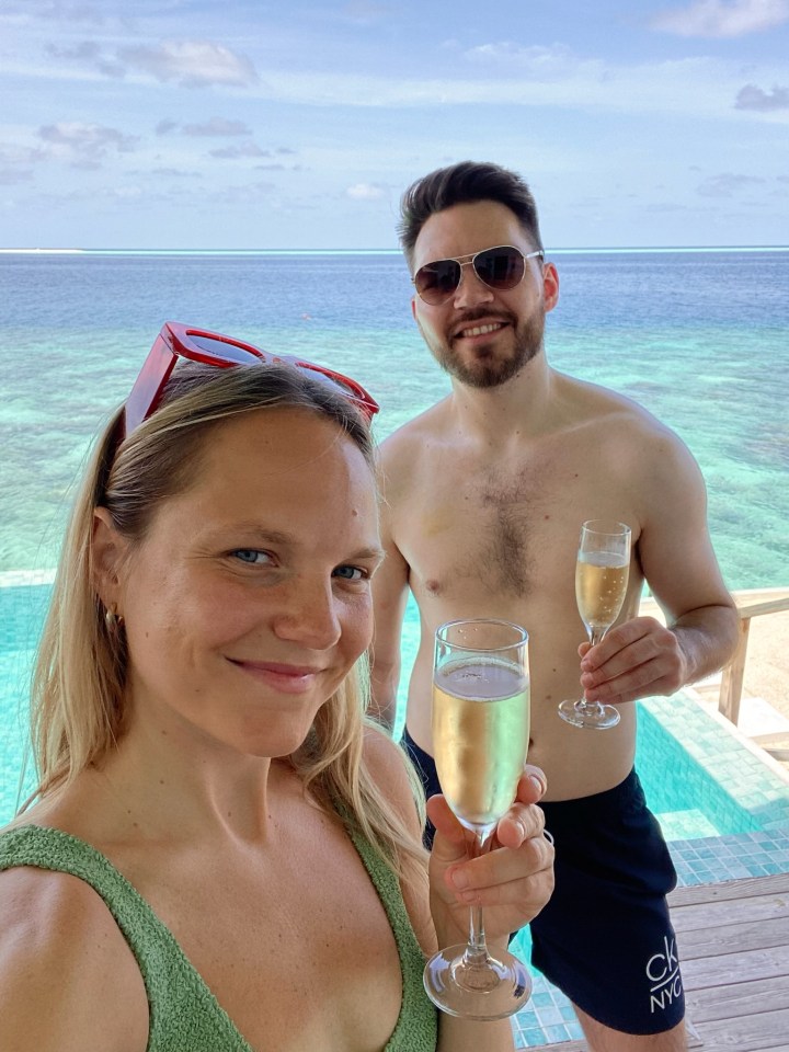 Sophie Swietochowski and her brother Luc enjoy a glass of champers