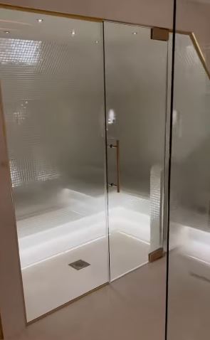 The new bathroom boasts a steam room