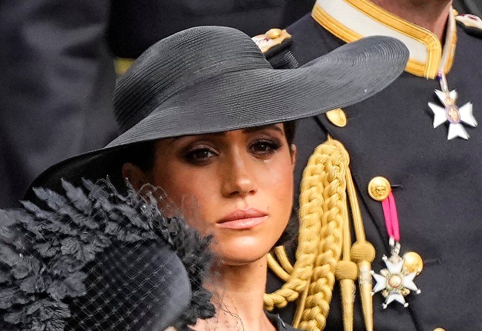 Meghan Markle was crying as the Queen's coffin was put in the hearse