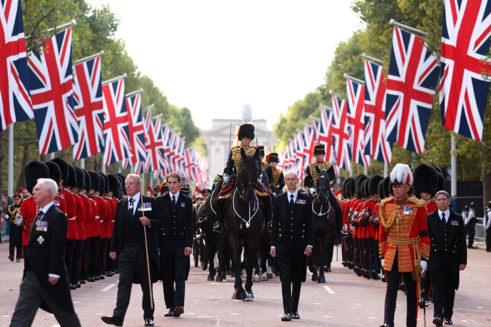 Crowds lined the streets to watch the Queen's procession