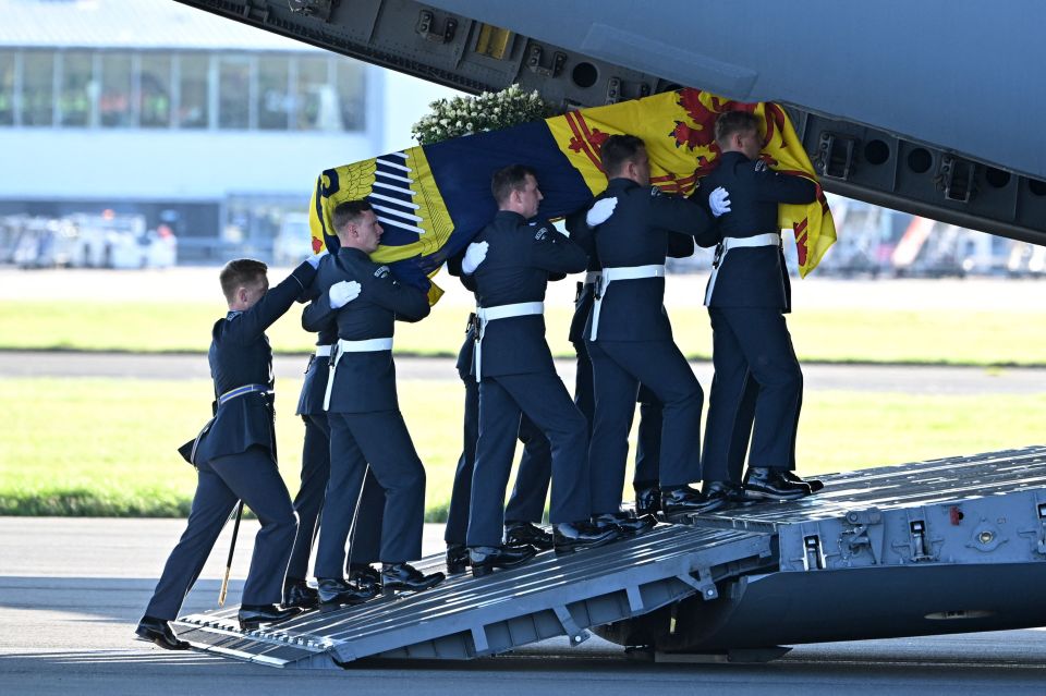 Pallbearers from the Queen's Colour Squadron of the RAF carrying the Queen's coffin