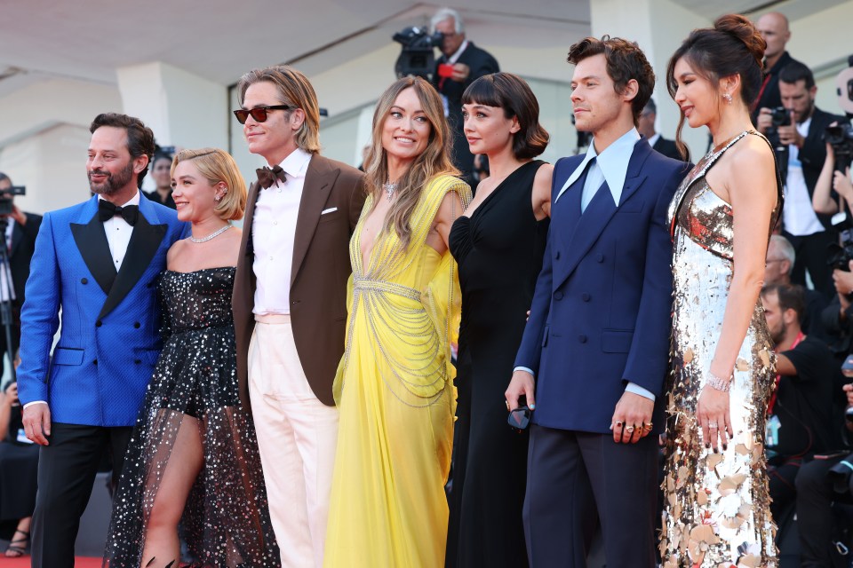 Nick Kroll, Florence Pugh, Chris Pine, Olivia Wilde, Sydney Chandler, Harry Styles and Gemma Chan attend the Don’t Worry Darling red carpet at the 79th Venice International Film Festival on September 05