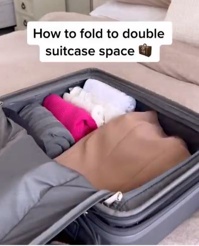 A mum has revealed how she folds her clothes to "double" the space in her suitcase