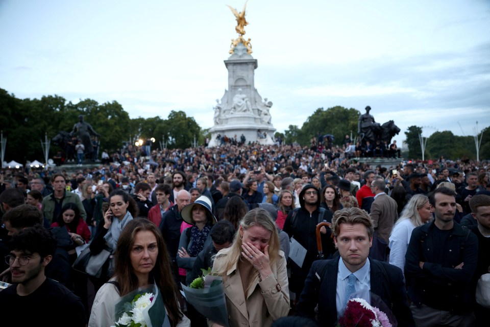 There was soon a sea of mourners outside the Palace