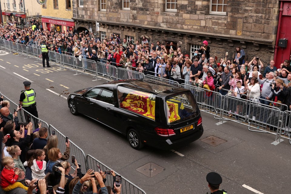 Thousands gathered to see The Queen make her final six-hour journey through Scotland to Edinburgh on Sunday