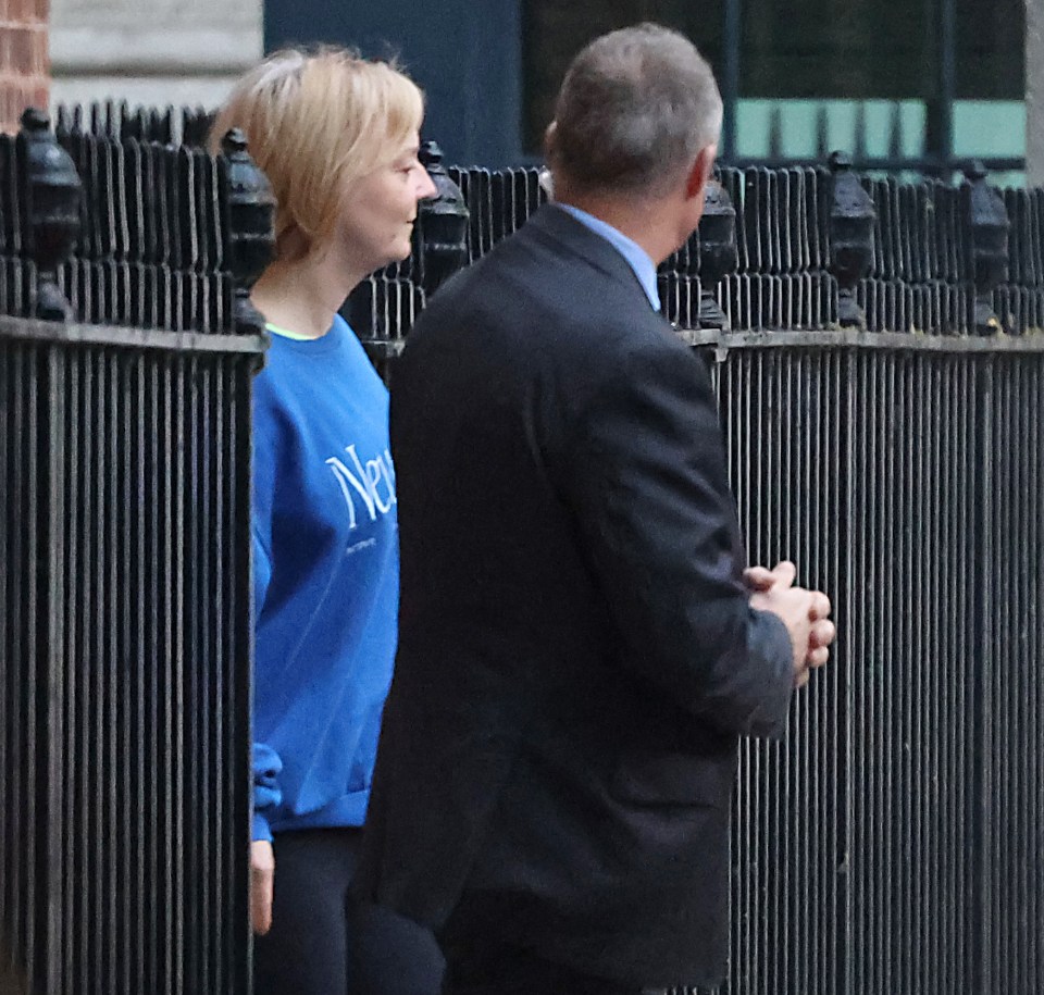 Liz Truss was seen going for her early morning exercise on Friday morning with a detective by her side ahead of the crunch OBR meeting