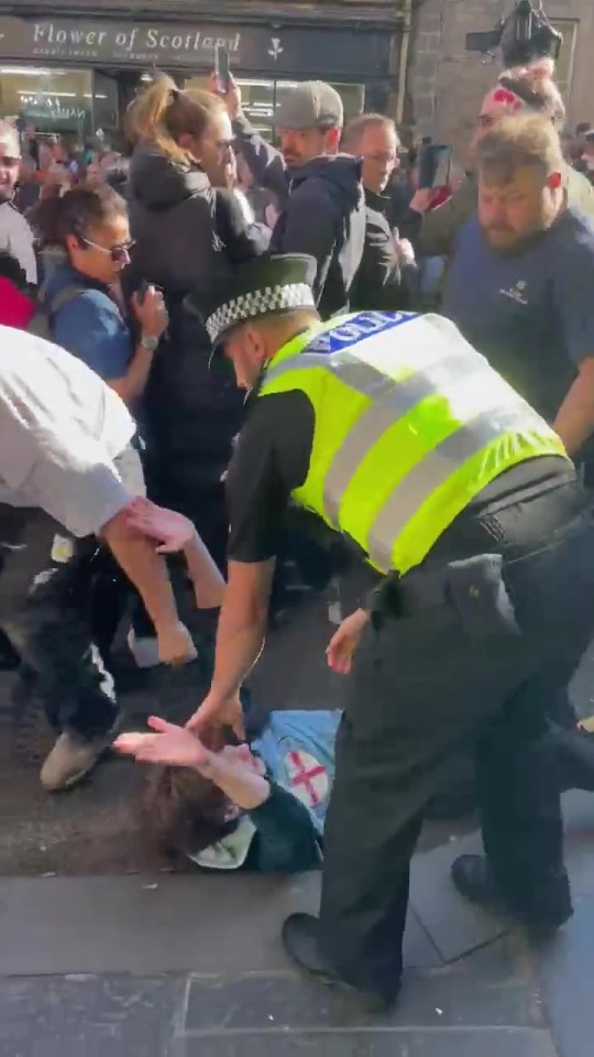 Prince Andrew heckler removed from procession by police in Edinburgh