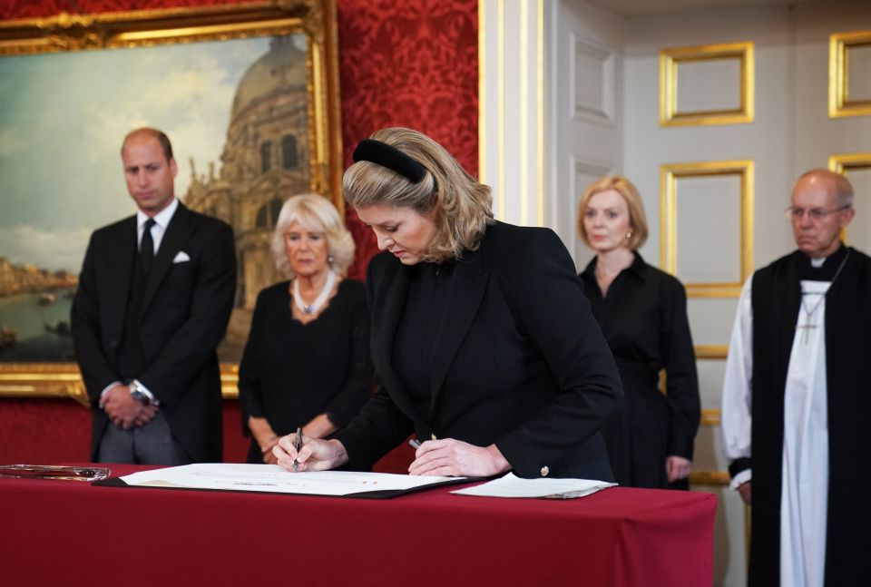 Penny Mordaunt at the table