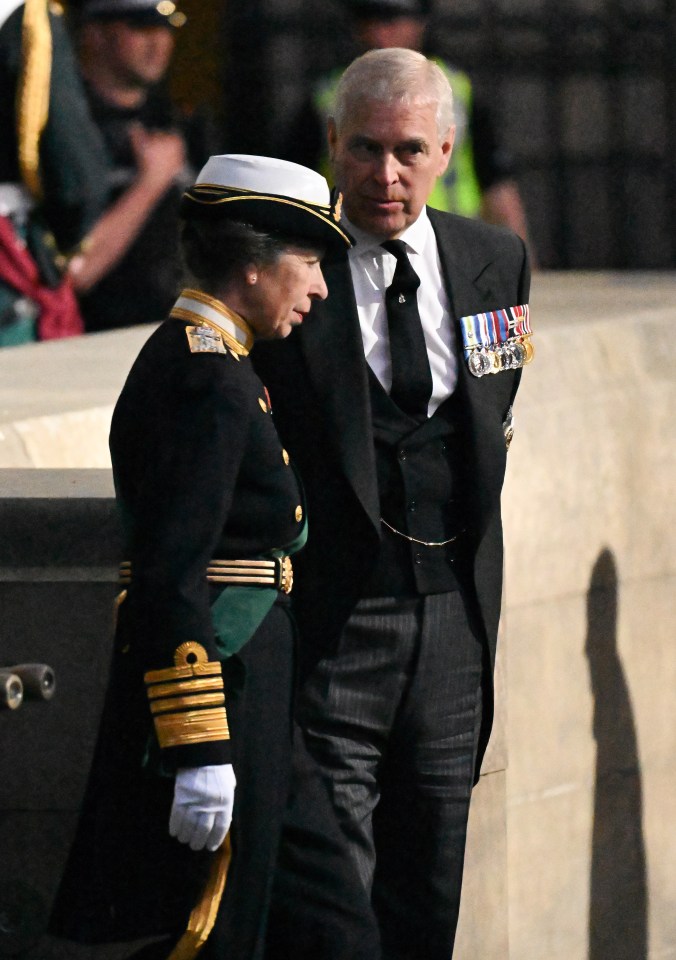 Prince Andrew appeared in a suit today but will wear uniform when he stands guard of the Queen's coffin