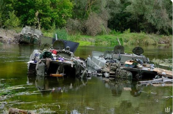 Tanks abandoned in a river by the fleeing Russians