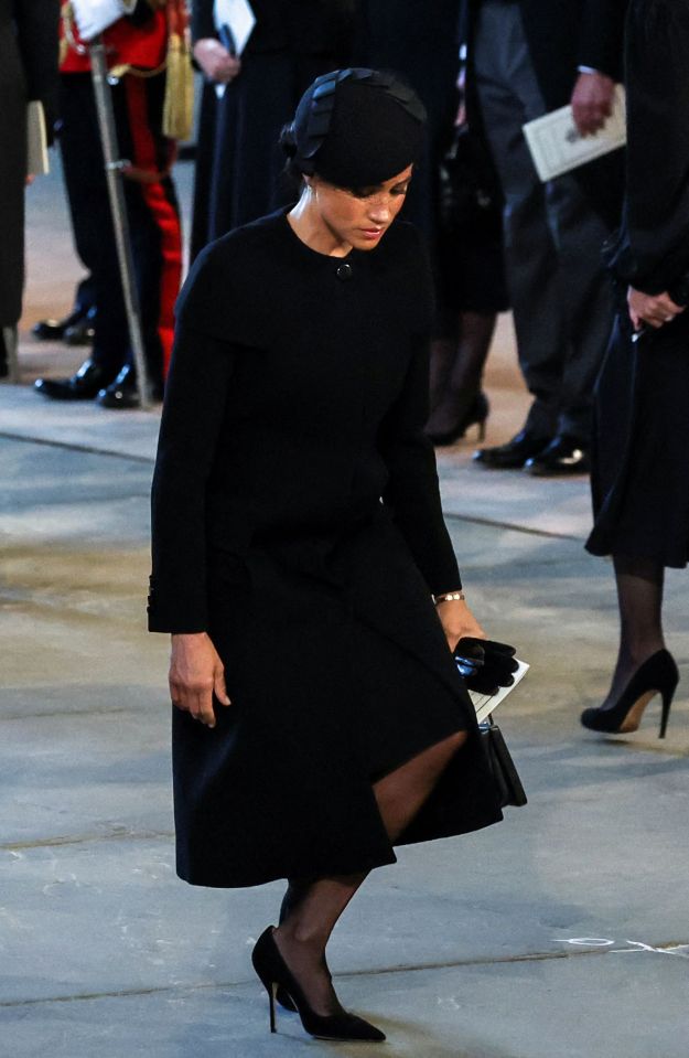 Meghan Markle curtseyed as she paid her respects to the Queen inside Westminster Hall