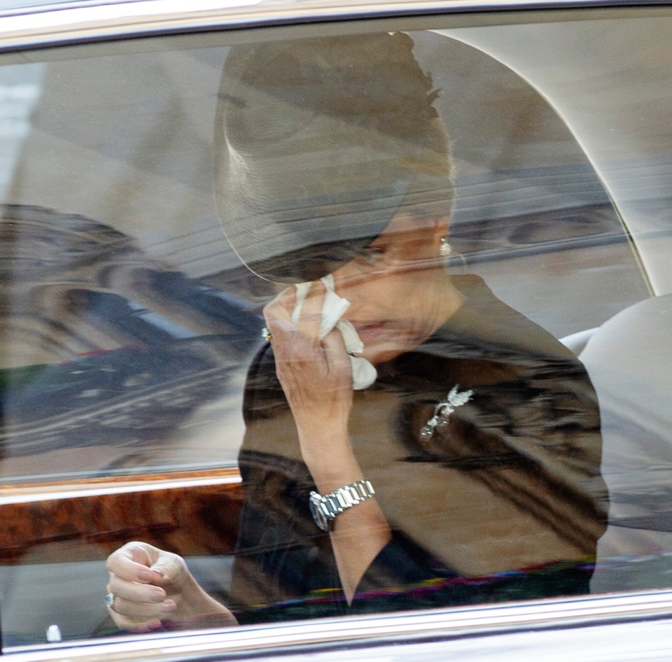 Sophie Countess of Wessex wipes away a tear as she is driven away from the Queen’s funeral service