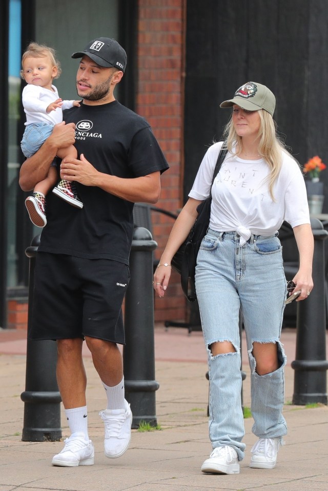 Alex Oxlade-Chamberlain and Perrie Edwards with son Axel