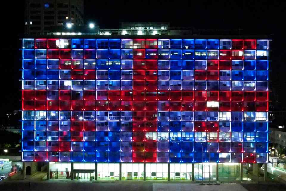 Tel Aviv's Municipality building is illuminated with the colours of the Union Jack