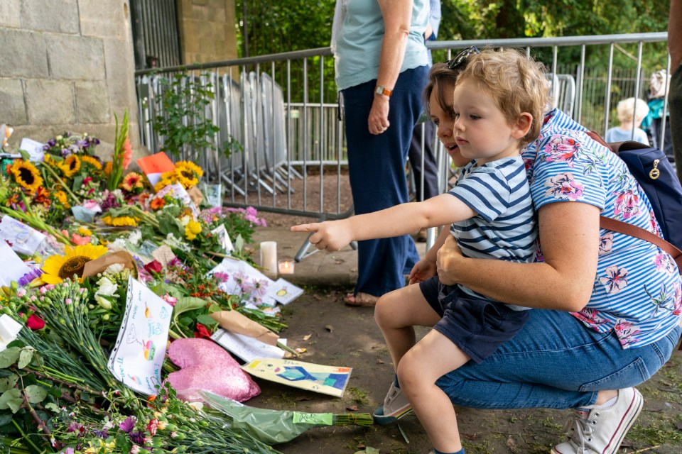 Thousands of flowers have also been left outside the gates of Windsor Castle