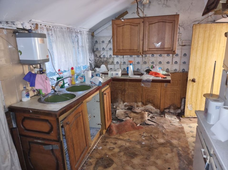 The kitchen in one of the homes is in need of cleaning - and renovation