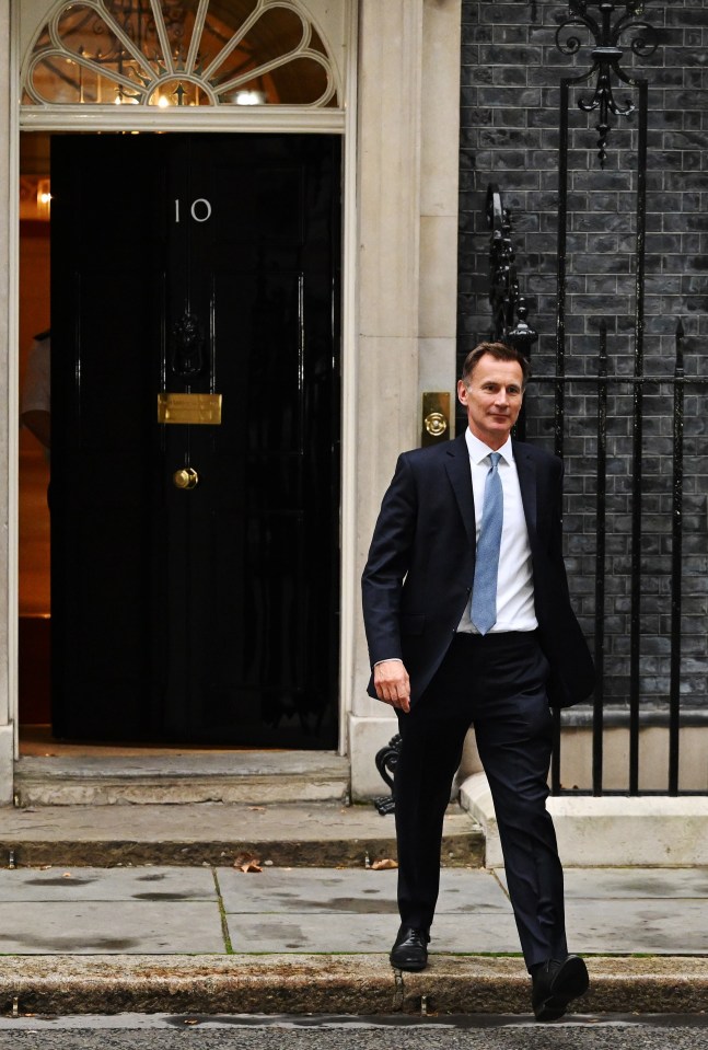 New Chancellor Jeremy Hunt leaves Downing Street after learning of his appointment replacing Kwasi Kwarteng at the Treasury