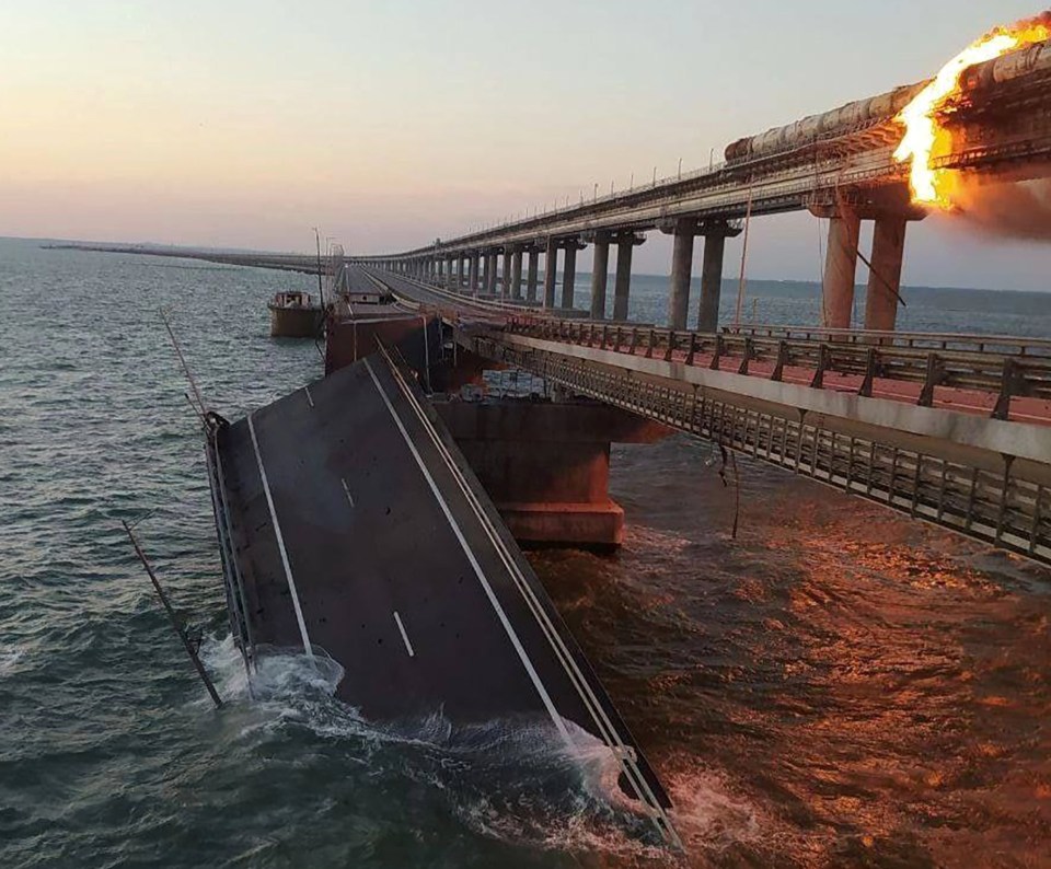 The explosion took out a section of a road bridge which runs parallel to the stricken rail route - collapsing it into the Black Sea