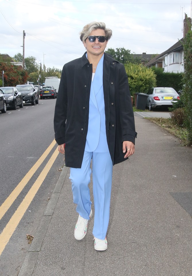 Nikita looked chic in a baby blue suit paired with sunglasses