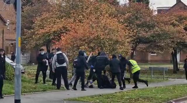 A group of young thugs brutally attacked another teen outside a school