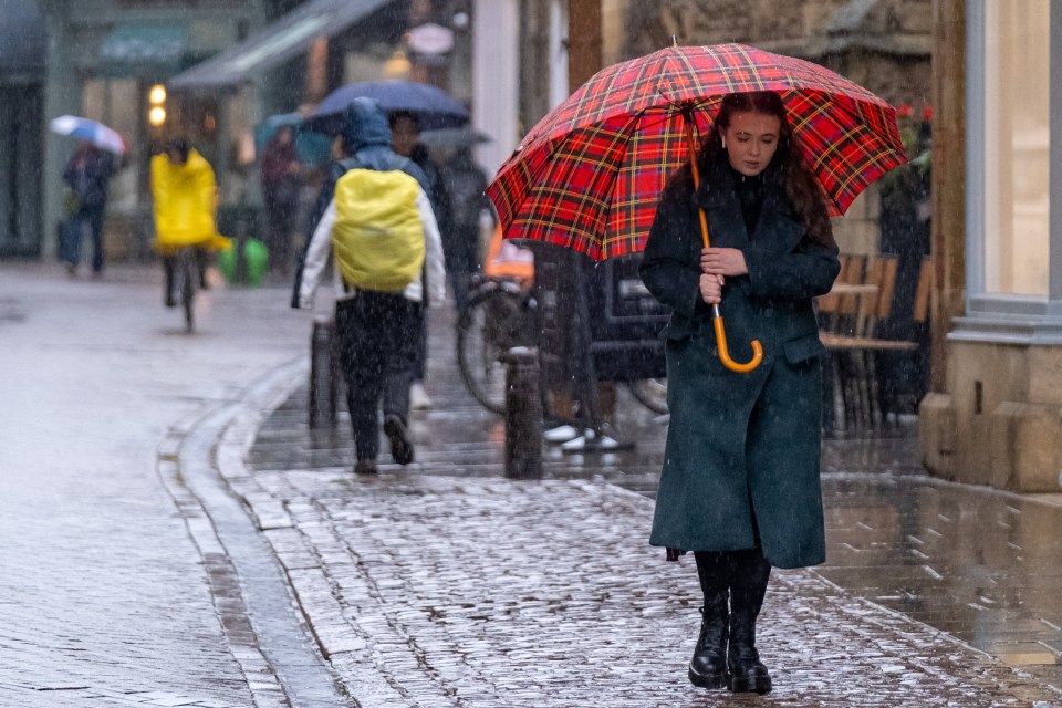 Heavy rain will sweep across Britain tomorrow