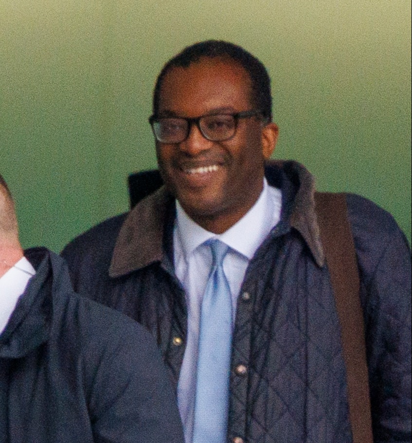 Kwasi Kwarteng smiles despite being thrown under the bus by Liz Truss