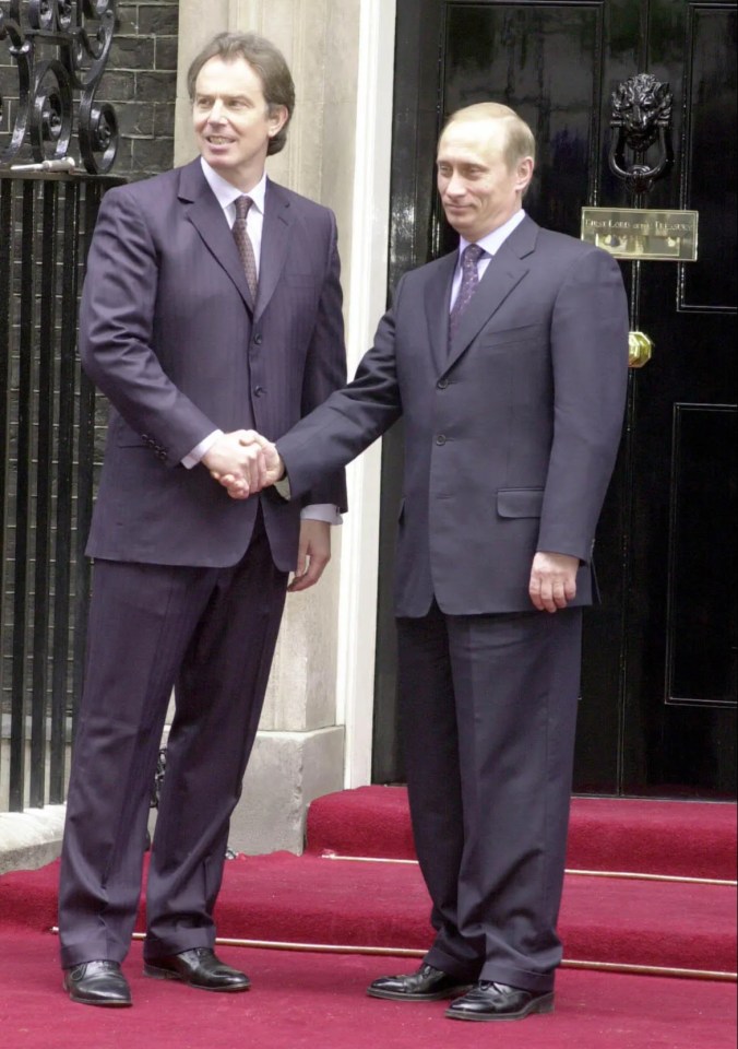 Tony Blair shakes hands with Putin outside Downing Street