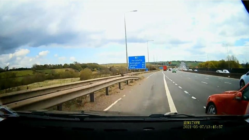 A red Mercedes cutting a learner driver off on the M1