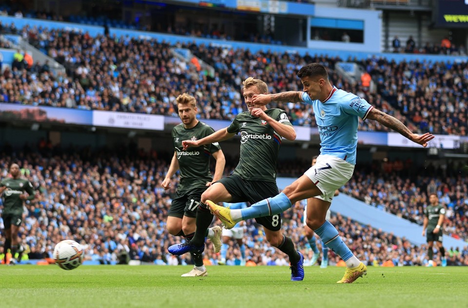 Joao Cancelo fires City into the lead