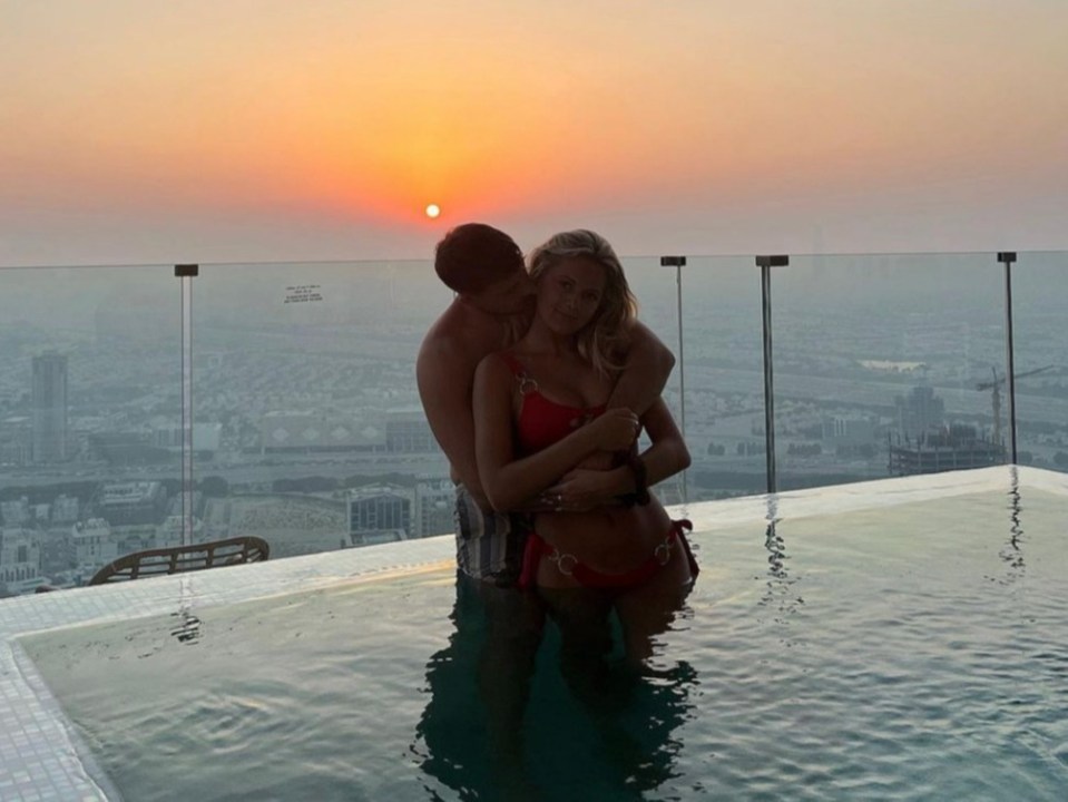 Andrew Le Page and Tasha Ghouri cuddle in their private pool on holiday in Dubai