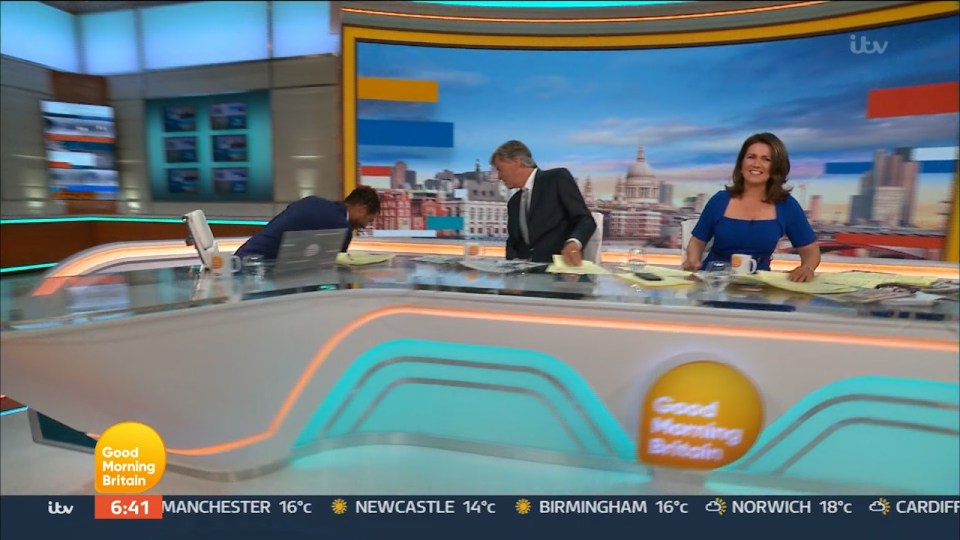 Newsreader Sean Fletcher was spotted scrambling to fix the furniture