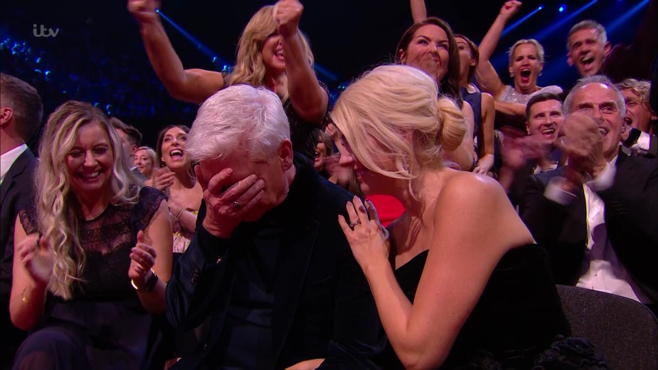 Phil breaks down as the pair win the award