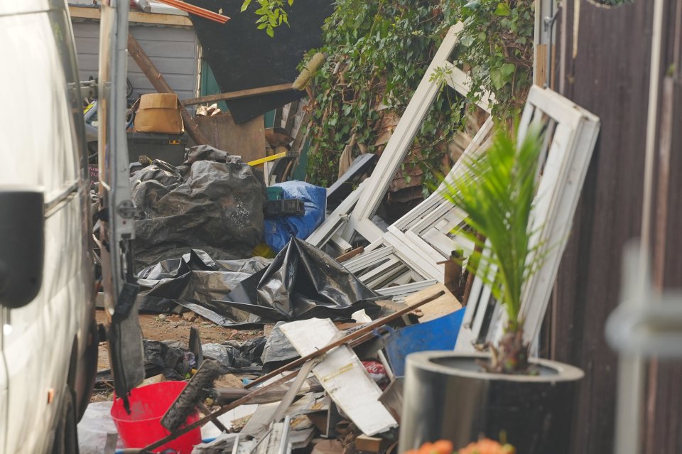 Horror pictures show the rubble where a wall collapsed and crushed a boy of 12 to death