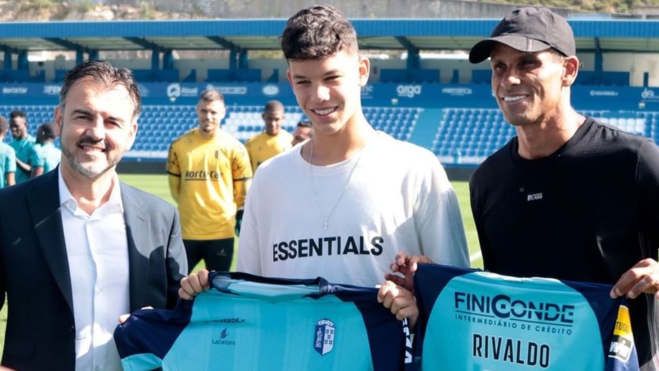 Joao Vitor, pictured with his dad, has joined Vizela in Portugal