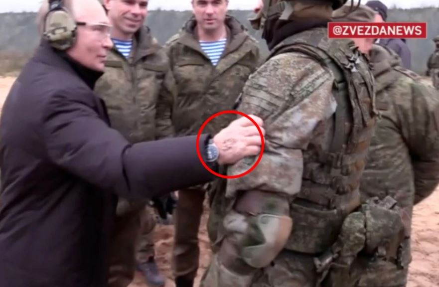 Putin pictured with suspected track marks from IV treatment on the back of his hand