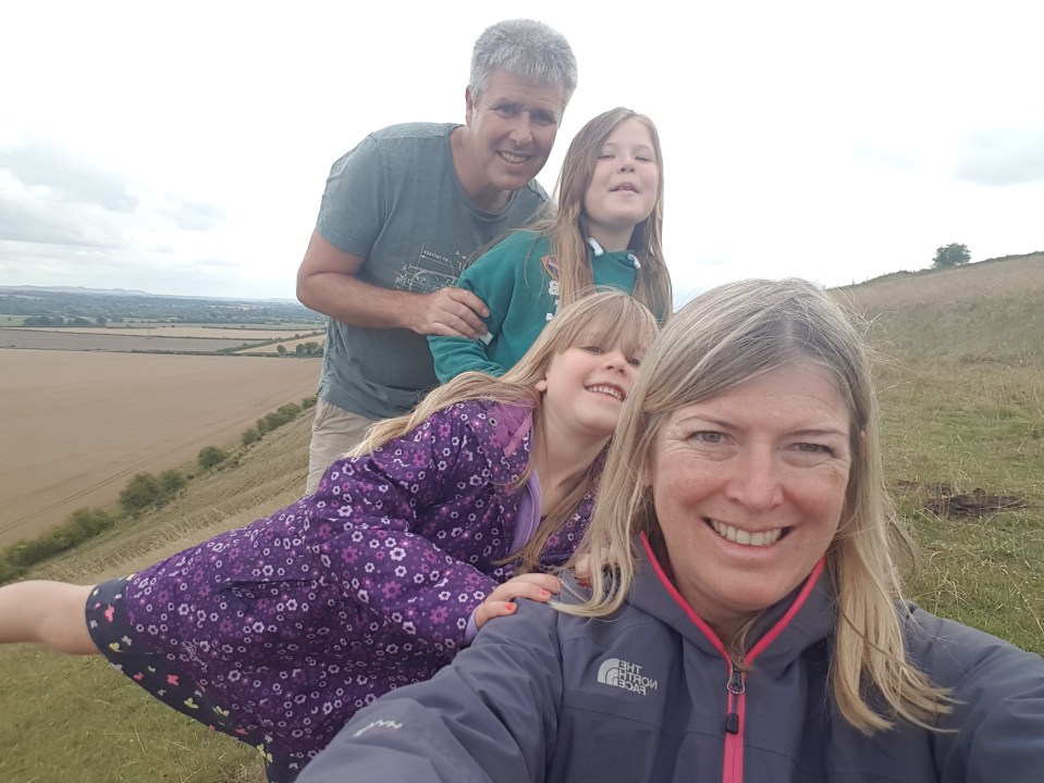 Jayne East with her husband David and daughters Josie and Abi