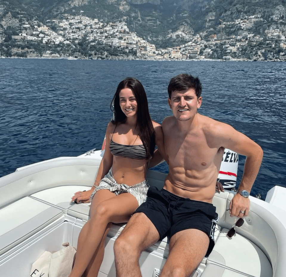 Maguire, 29, on holiday with wife Fern Hawkins earlier this year