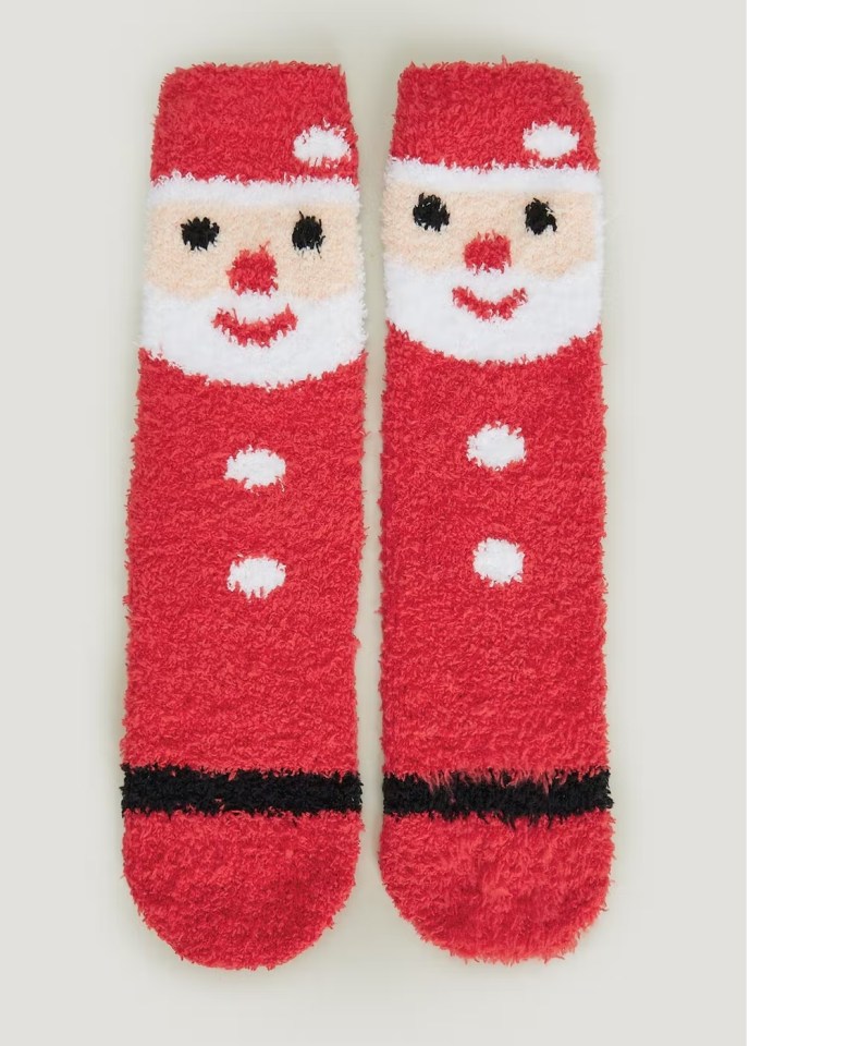 Keep the little one's feet warm with these cute Santa socks