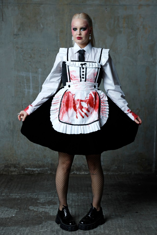 Anne-Marie dressed up as a bloodstained maid