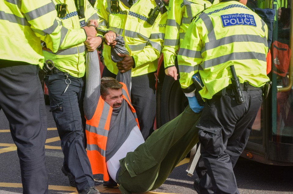 Police arrest a Just Stop Oil protester in Islington