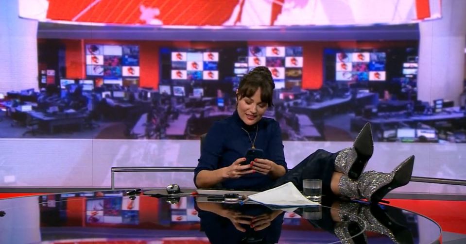 The BBC presenter was then seen checking her phone