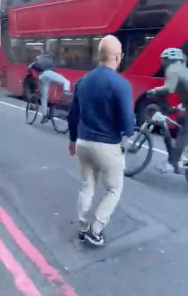 Towards the end of the footage, two men are seen cycling off